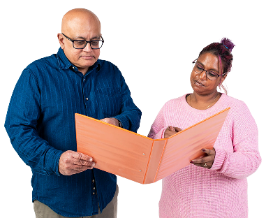 A person supporting someone else to read a document.